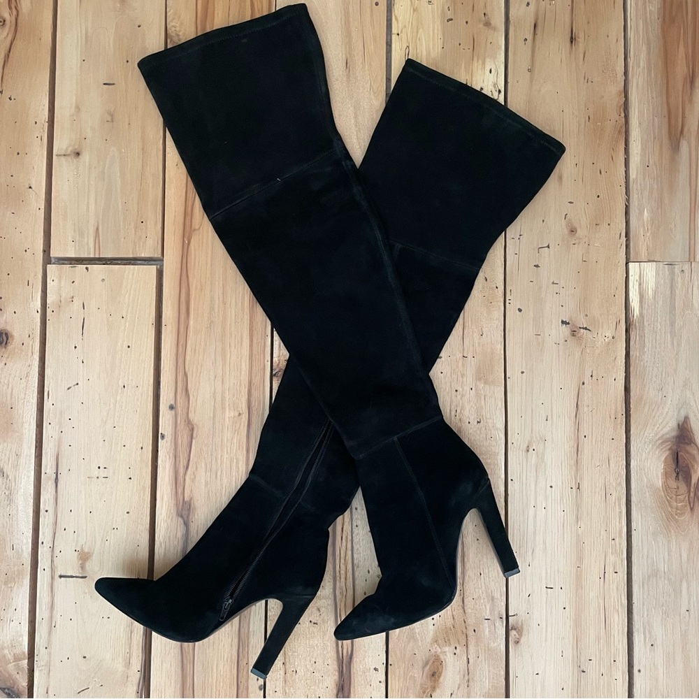 Thigh high black leather boots